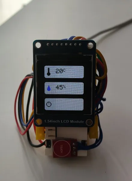 The weather station showing 20 °C and 45% humidity